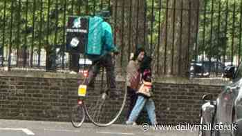 Deliveroo transports food to customers in west London on penny farthing bicycle from 1880s