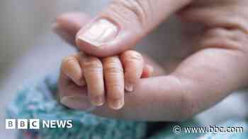 NHS trust improving after baby deaths - report