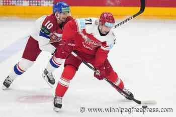 Peterka scores twice for Germany in 8-1 rout of Latvia at hockey worlds