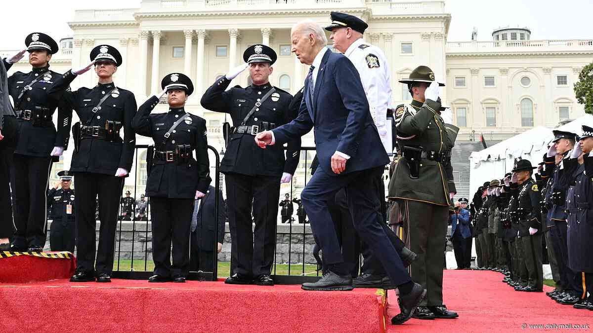 Steady on Joe! Biden, 81, catches himself after tripping on a step again