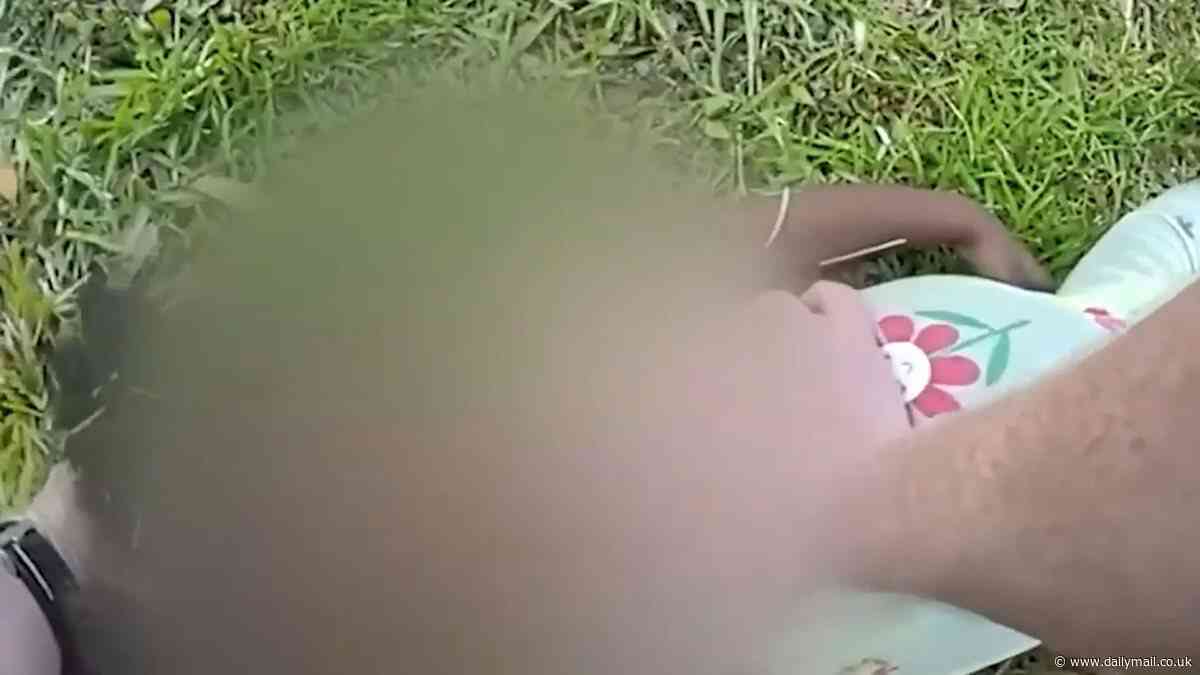Incredible moment neighbors save a two-year-old girl's life by performing CPR on her on the bank of a pond after she fell in and nearly drowned