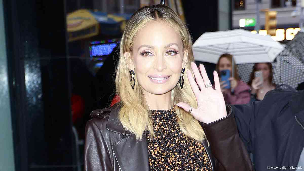 Nicole Richie is chic in a black-and-gold dress under a leather coat in NYC... after announcing a new show with her Simple Life costar Paris Hilton