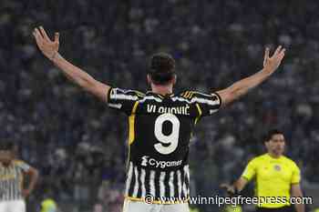Dusan Vlahovic scores early and Juventus beats Atalanta 1-0 in the Italian Cup final