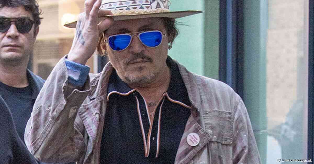 Johnny Depp takes a stroll carrying pirate book sparking Jack Sparrow return rumours