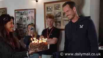 Andy Murray returns to the tennis court for the first time since suffering ankle injury... as he claims victory on his 37th birthday and toasts his success with a birthday cake