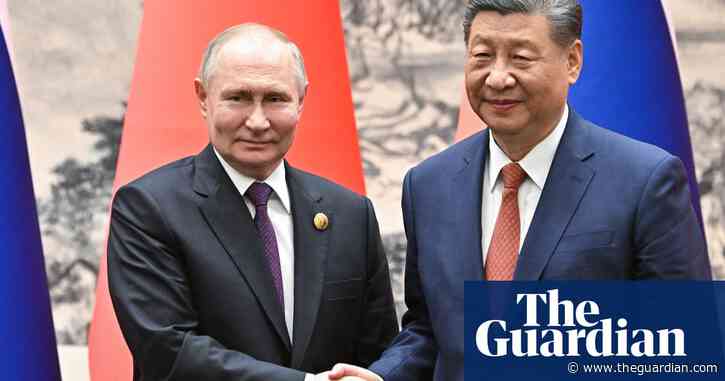 Putin and Xi announce plans to strengthen military ties in Beijing