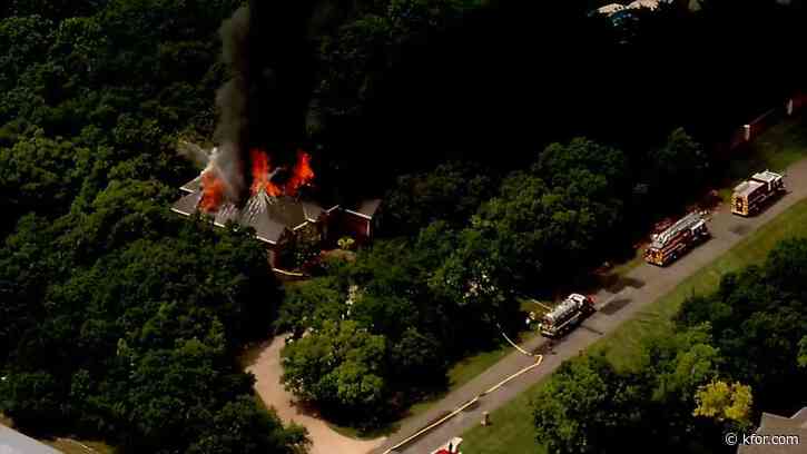 Firefighters respond to home engulfed in flames in Edmond