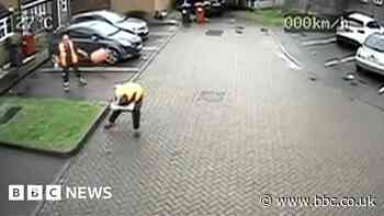 Refuse workers dodge exploding gas canister