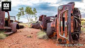 Rusted, burnt-out cars plaguing outback landscape that 'just don't belong here'