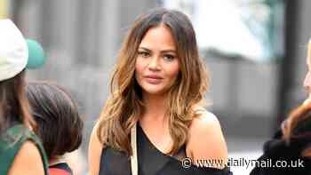 Chrissy Teigen looks stylish as she shops at Gucci after posing for Sports Illustrated cover