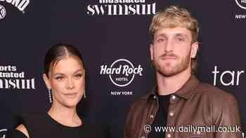 Logan Paul looks like a proud papa as pregnant fiancée Nina Agdal flaunts her baby bump in a black cutout dress at 2024 Sports Illustrated Swimsuit Issue launch party