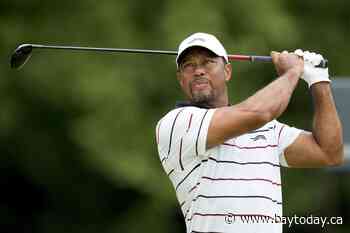 Woods gets stuck in sand, makes two early triples en route to a 77 to miss the cut at PGA Championship
