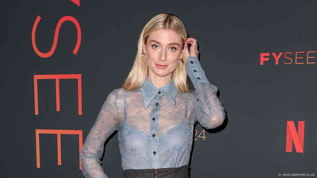 Elizabeth Debicki cuts a chic figure in sheer lace blouse as she promotes The Crown in Los Angeles - after admitting playing Princess Diana 'left her crippled with extreme terror'
