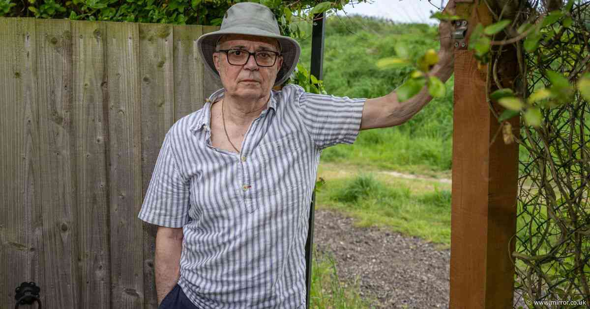 Pensioner blocked into his own garden by chain-link fence after bizarre neighbour row