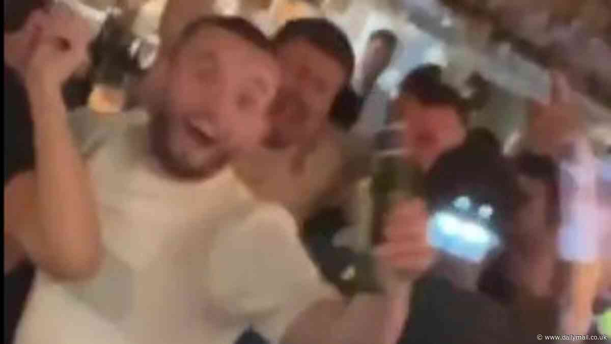 Aston Villa fans spot John McGinn on a night out in Birmingham singing Michael Jackson... with captain still celebrating his side's Champions League qualification before final game this season