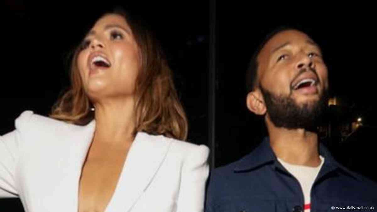 Chrissy Teigen and John Legend shrug off backlash as they party away at JBL Fest in NYC after they were accused of 'kicking out' girls in photo booth to use themselves