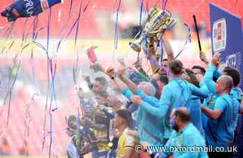 Oxford United lift League One play-off final trophy