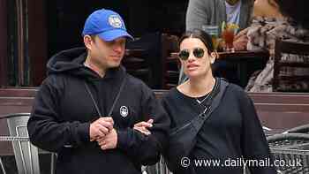 Pregnant Lea Michele, 37, walks arm-in-arm with husband Zandy Reich as they stroll through New York