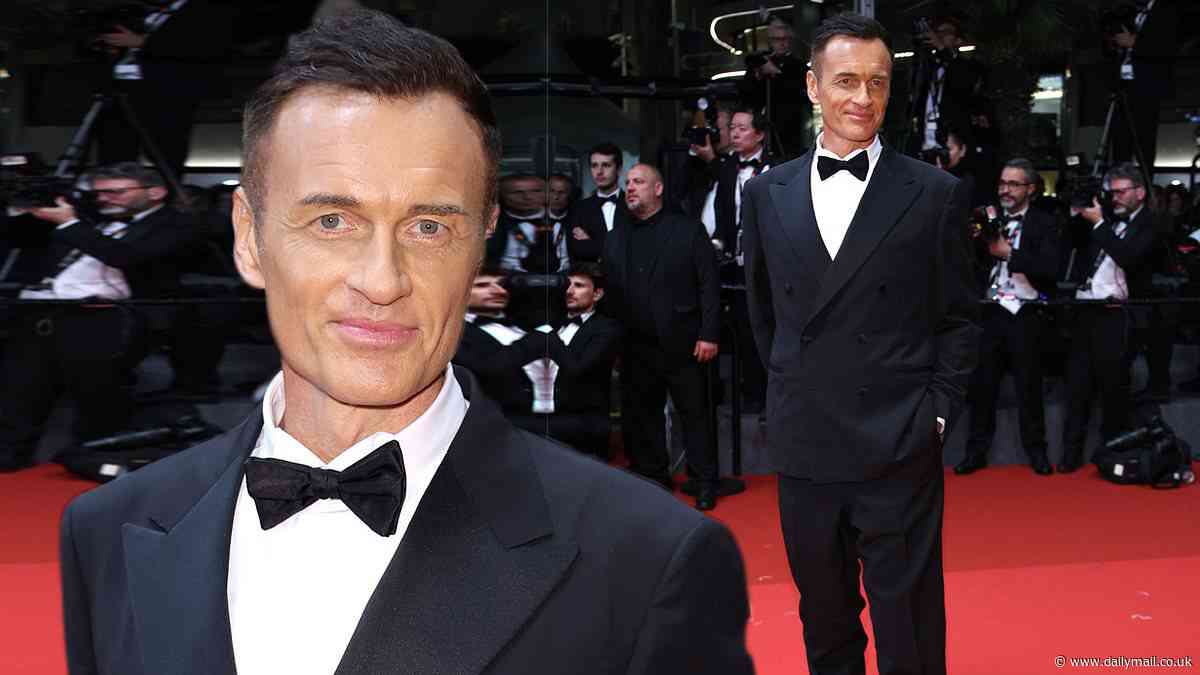 Nip/Tuck star Julian McMahon reveals his very bronzed complexion as he attends The Surfer premiere at Cannes Film Festival