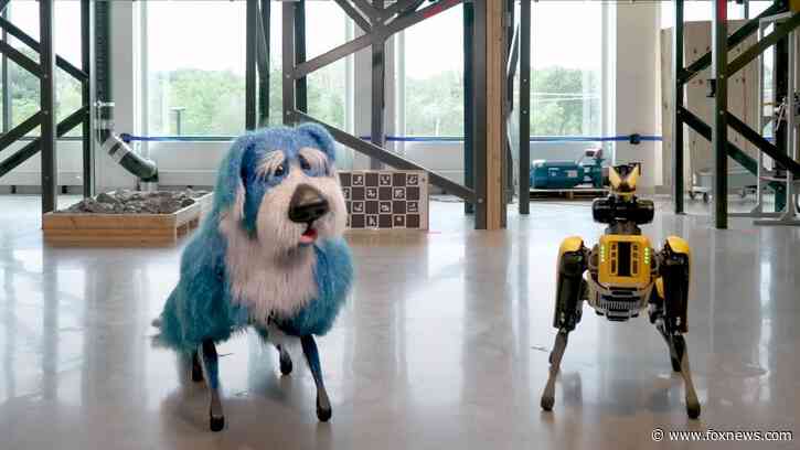 Boston Dynamics' creepy robotic canine dances in sparkly blue costume
