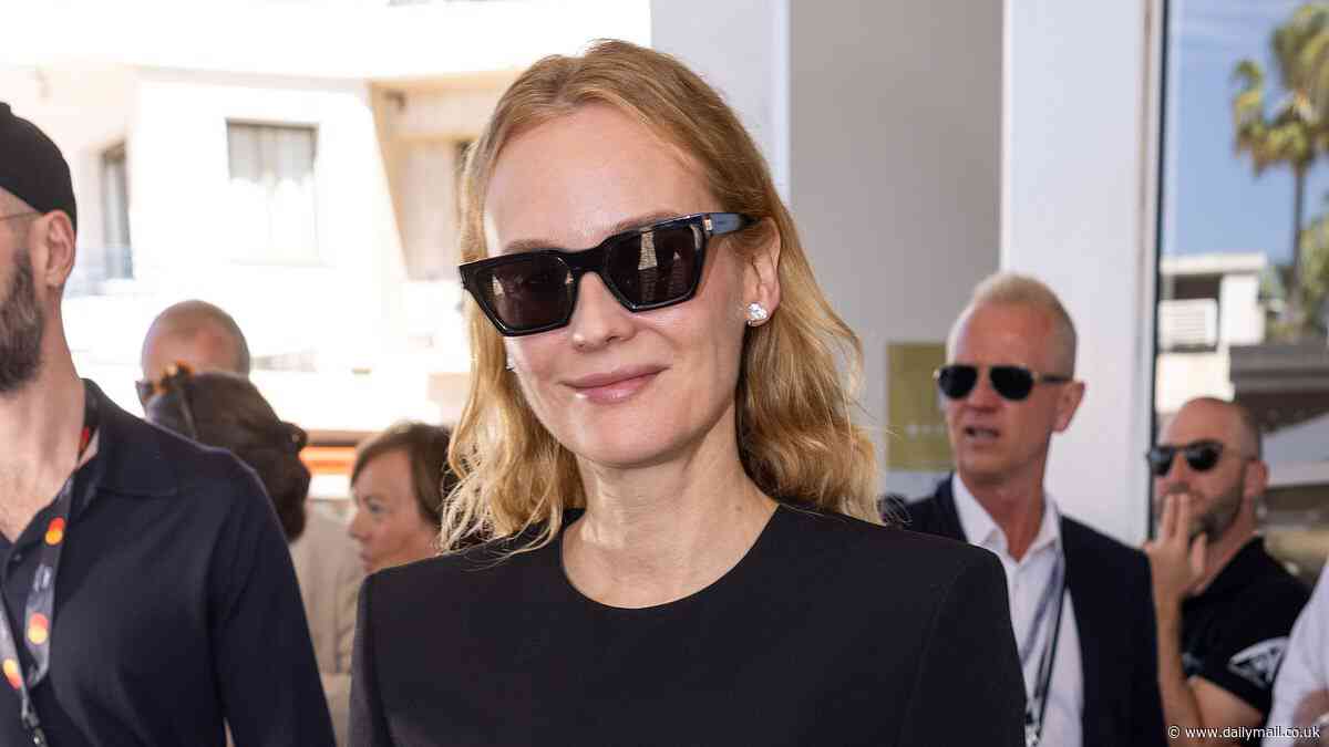 Diane Kruger shows off her tanned legs in a black minidress as she leaves her hotel during Cannes Film Festival
