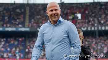 Feyenoord pay tribute to incoming Liverpool manager Arne Slot on final day of Dutch season... as fans unveil gigantic 'WALK ON' banner devoted to him