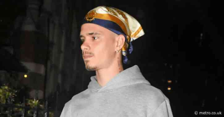Romeo Beckham, 21, is spitting image of dad David as he rocks his famous bandana