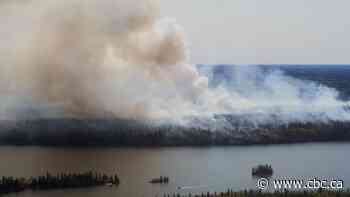 Residents relieved as they begin return to fire-threatened Cranberry Portage