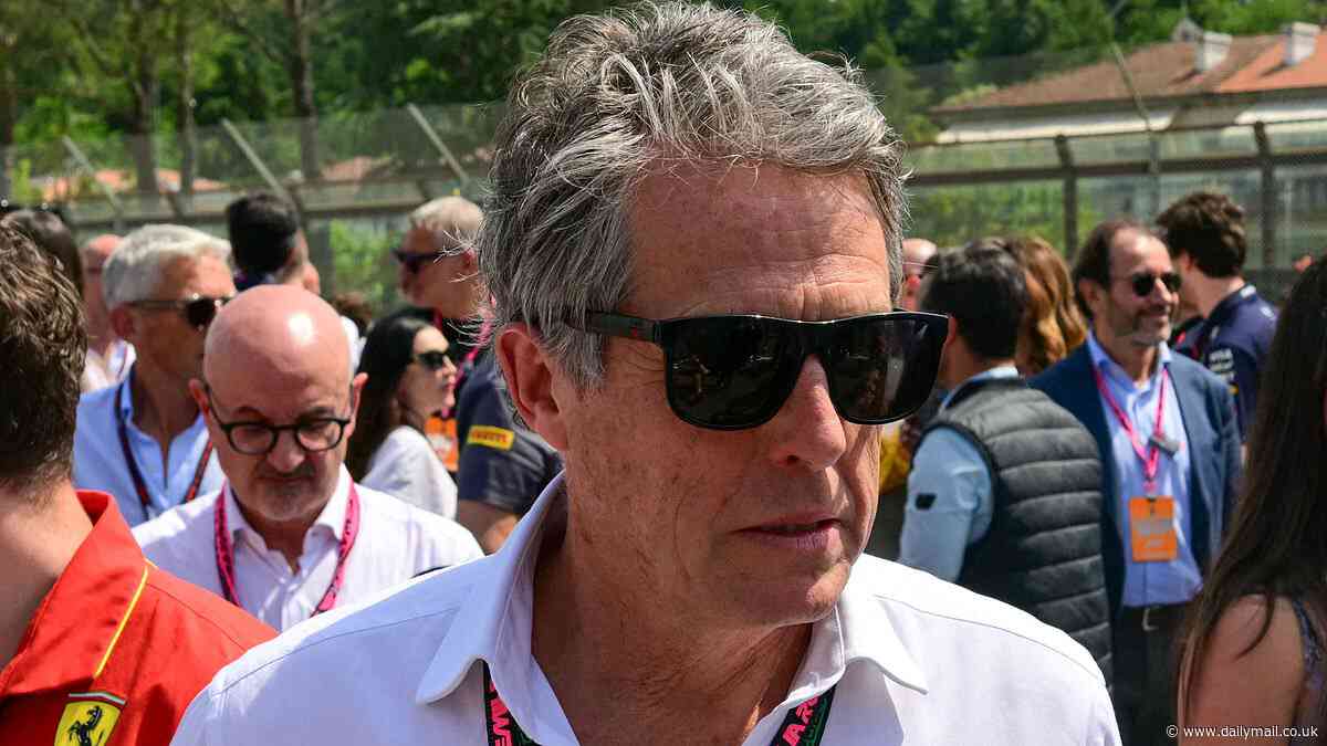 Hugh Grant, 63, is joined by glamorous wife Anna Eberstein, 41, as they make an appearance at the Formula One Grand Prix in Italy