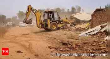 Cops raze illegal constructions of 4 accused of cow slaughter