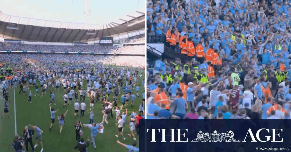 Fans invade pitch as City claim fourth-straight title