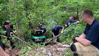 Lawn tractor rolls onto man in Ledyard, minor injuries reported