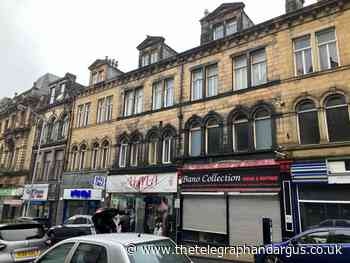 Restoration of building's Victorian shop fronts is approved