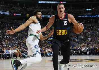 Edwards leads Wolves back from 20-point deficit, beat defending champion Nuggets 98-90