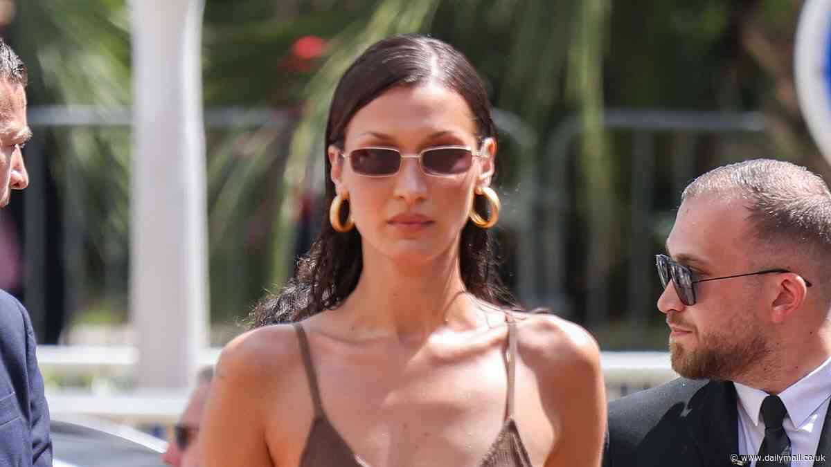 Bella Hadid goes braless in a thigh-skimming fitted minidress at the 77th annual Cannes Film Festival