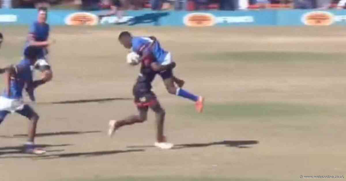 'Best rugby tackle ever' leaves viewers stunned as player carried for 20 metres