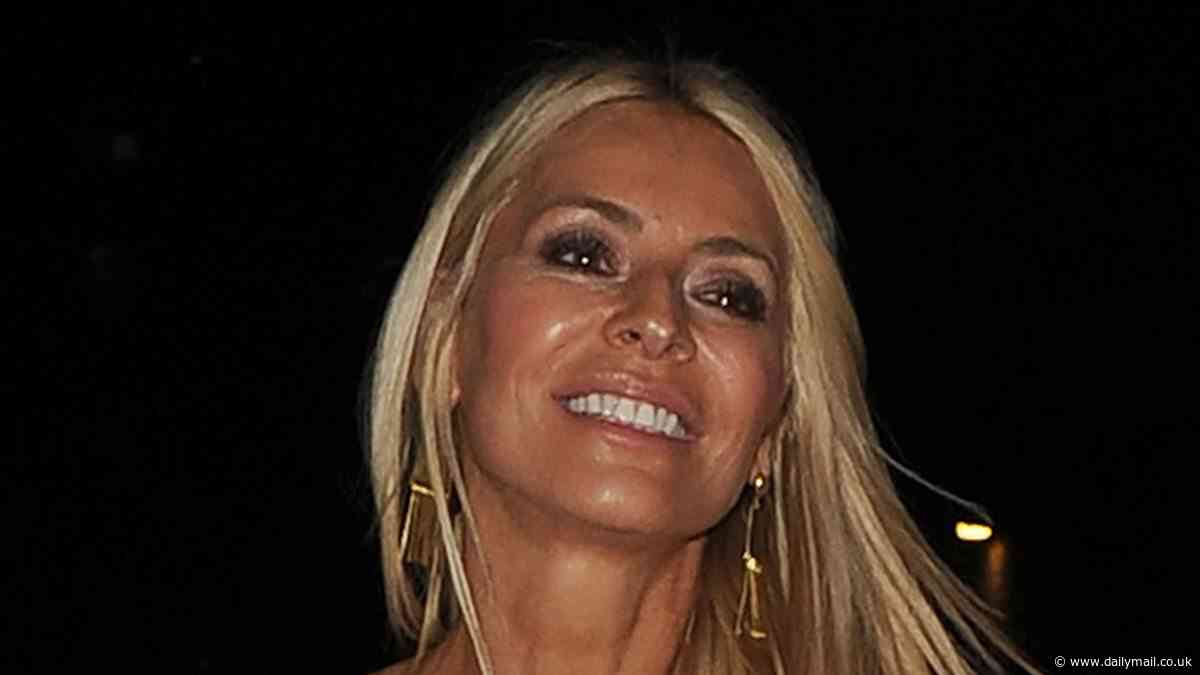 Tess Daly, 55, shows off her golden tan in a strapless white dress as she parties the night away with pals at The Chiltern Firehouse