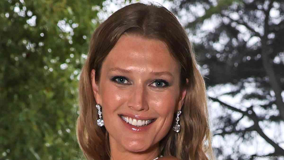 Toni Garrn stuns in an elegant white gown while fellow model Wallis Day flashes her abs in a black crop top at the Bee:Wild event in Cannes