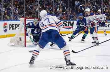 CP NewsAlert: Oilers advance to Western Conference final with 3-2 win over Canucks