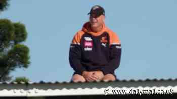 Strange scenes as GWS Giants coach Adam Kingsley is spotted on the ROOF at team's training run - but he has an explanation