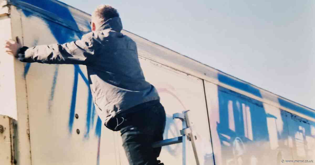Banksy spotted in unseen photos painting his biggest ever work before he was famous