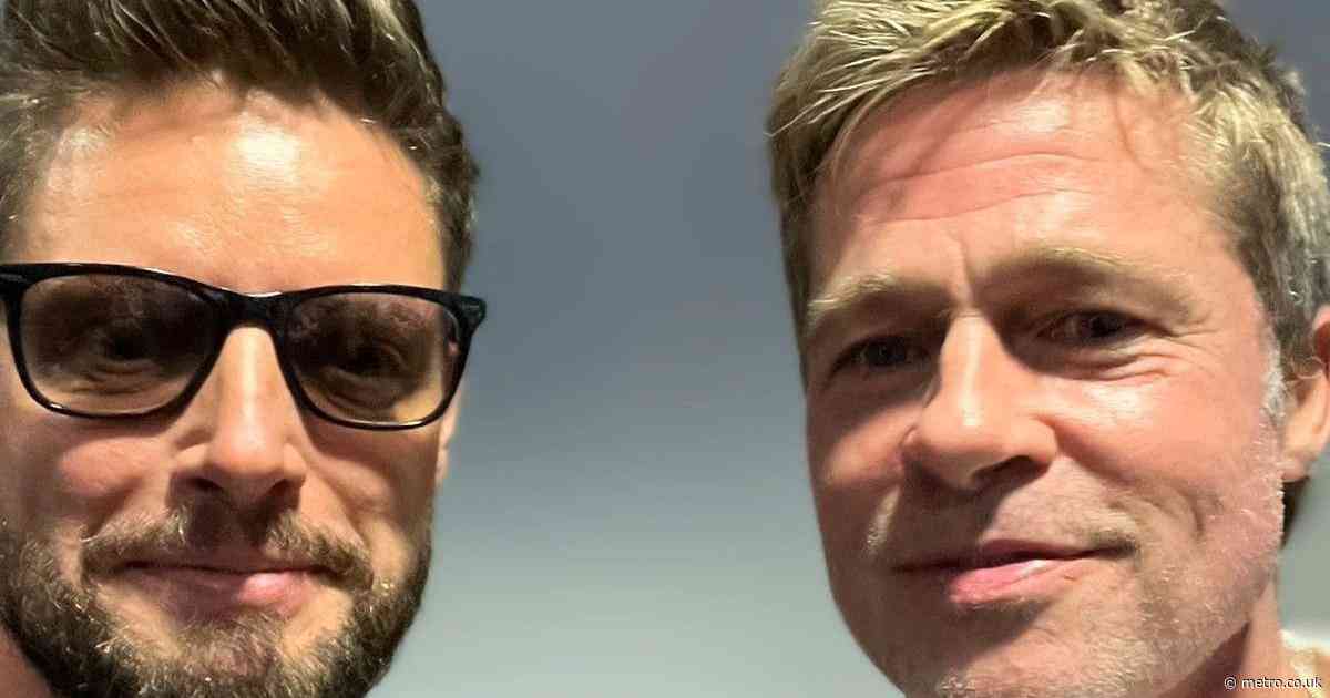 Boyzone star confuses everyone as he poses with Brad Pitt – or did he?