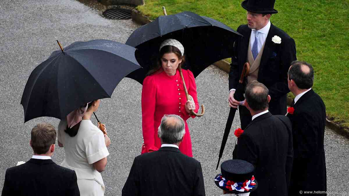 Princess Beatrice has Hollywood moment in waist-defining dress as she braves the rain