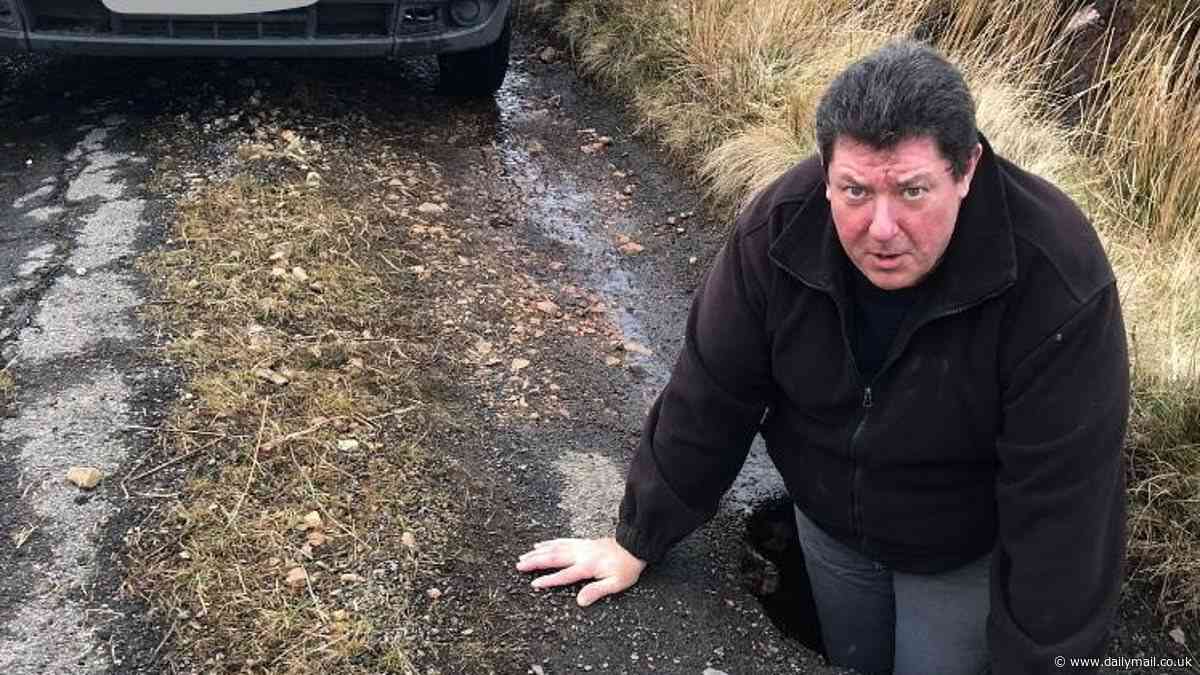 The potholes so big you can stand in them: Fury over waist-deep craters blighting Britain's roads