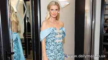 Nicky Hilton wows in a blue sequinn off-the-shoulder gown as she prepares for a night on the French Riviera at the  77th annual Cannes Film Festival