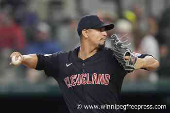 Guardians pitcher Carlos Carrasco placed on IL and won’t face his former team, the Mets