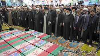 Iran's Supreme Leader Ali Khamenei prays over Ebrahim Raisi's coffin as huge crowds of mourners throng the streets of Tehran for President's funeral days after devastating helicopter crash