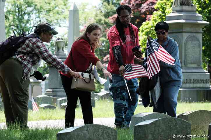PHOTOS | Woodlawn Cemetery Memorial Day flagging