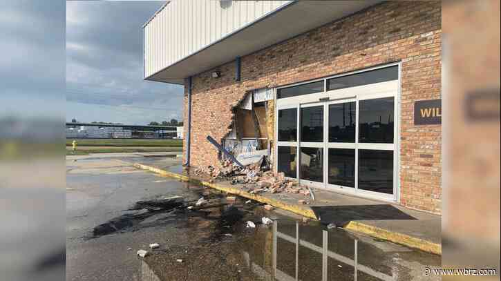 One person injured after vehicle crashes into Baton Rouge business