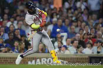 Fried pitches a 3-hitter and Ozuna homers to help the Braves beat the Cubs 9-2
